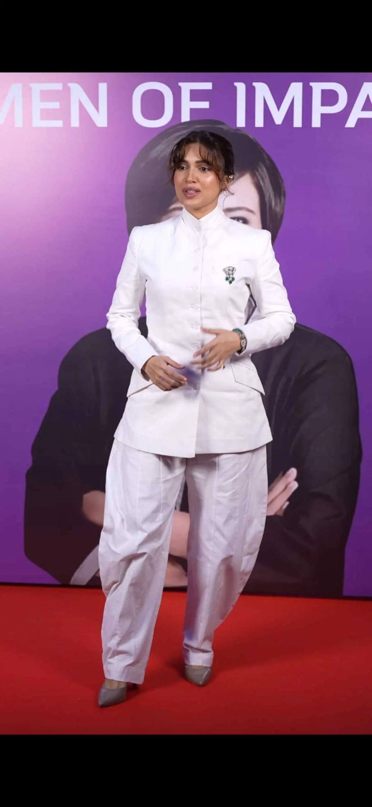 Bhumi Pednekar looked stunning in an all-white outfit featuring white pants and a shirt-style top.